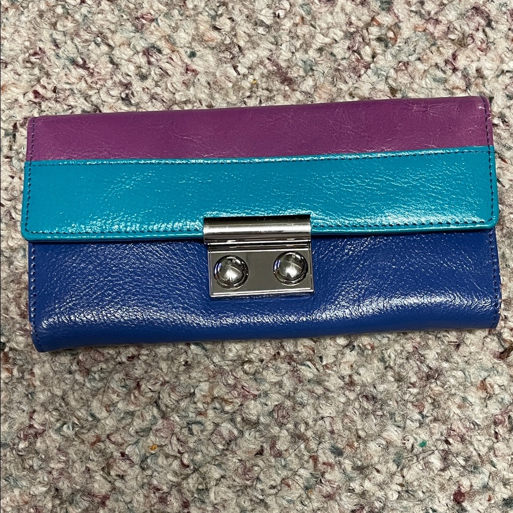 Danier tri colour leather Women's fold out Wallet with metal clip front